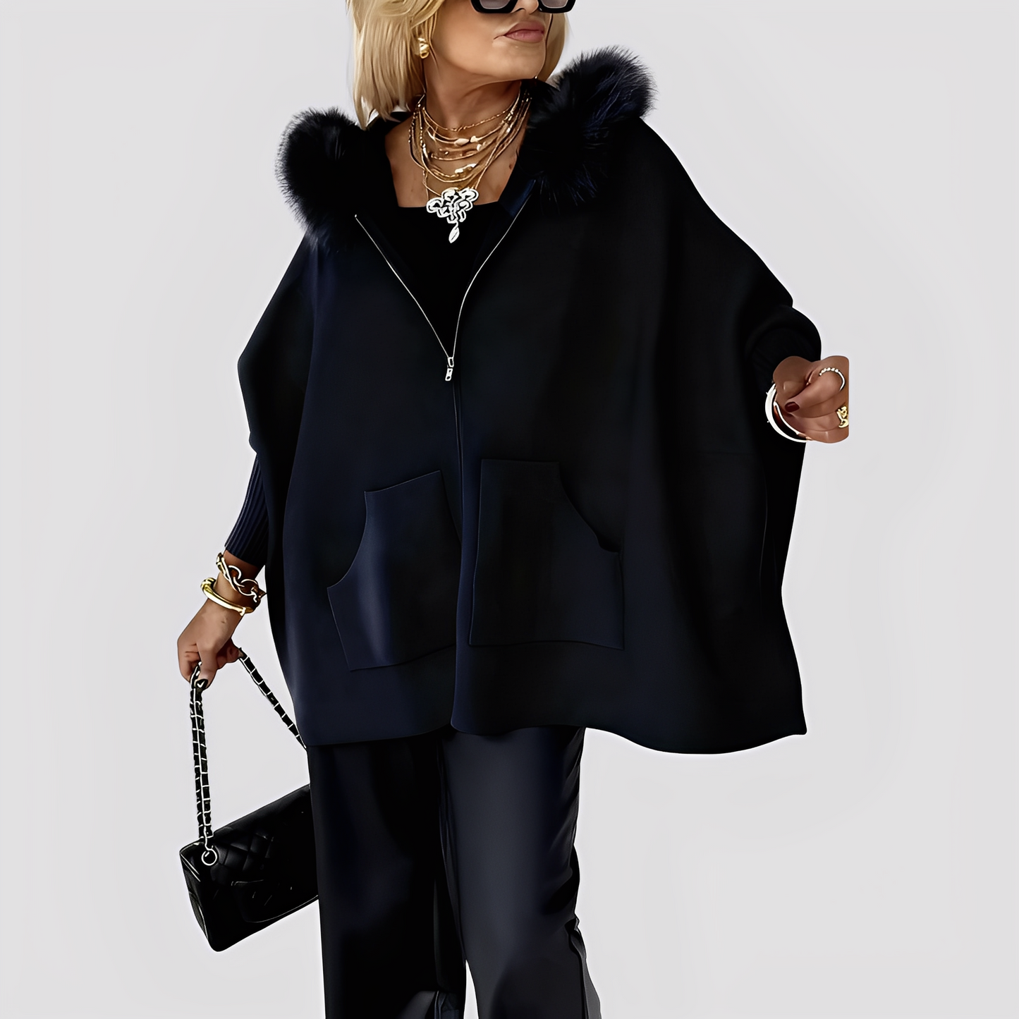 Elvena - Stylish women's faux fur coat with hood