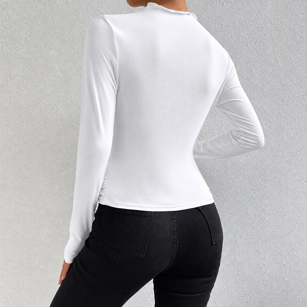 Livia - Langärmliges, figurbetontes Shirt mit Rüschen